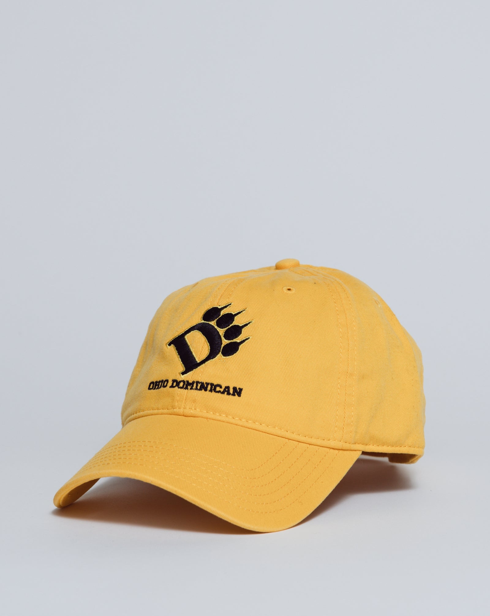 Yellow cap with black logo on a light gray background